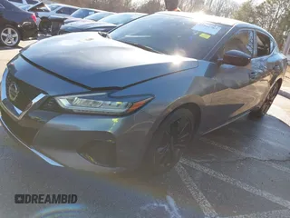 2020 Nissan Maxima S with VIN 1N4AA6BV7LC381254, listed as a IAAI auction lot 41246789 with 73,562 mi miles and . Bid and sale history available at DreamBid. Image 2.