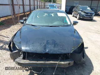 2012 Volkswagen Passat SE z VIN 1VWBH7A37CC065205, wystawiony jako IAAI lot #41977813 z przebiegiem Nie podano mil oraz . Historia ofert i sprzedaży dostępna na DreamBid. Obrazek 13.