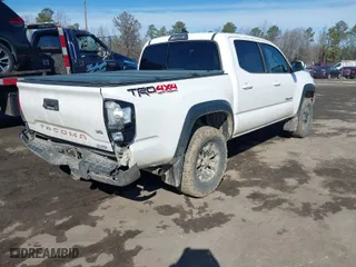 2018 Toyota Tacoma SR with VIN 3TMCZ5AN5JM171240, listed as a IAAI auction lot 41532601 with 157,840 mi miles. Bid and sale history available at carsss.com. Image 4.