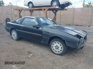 1986 Toyota Supra z VIN JT2MA70L4G0010843, wystawiony jako IAAI lot #41966751 z przebiegiem 205 187 mil mil oraz . Historia ofert i sprzedaży dostępna na DreamBid. Obrazek 1.