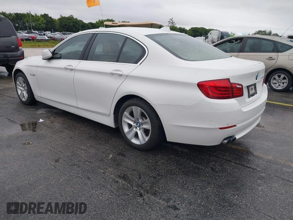2012 BMW 5 Series 528i with VIN WBAXG5C55CDW85766, listed as a IAAI auction lot 41373727 with 105,056 mi miles. Bid and sale history available at carsss.com. Image 3.
