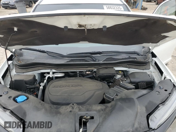 2021 Honda Pilot Special Edition z VIN 5FNYF6H2XMB022654, wystawiony jako Copart lot #58832335 z przebiegiem 32 493 mil mil oraz Szkoda całkowita • Salvage title. Historia ofert i sprzedaży dostępna na DreamBid. Obrazek 12.