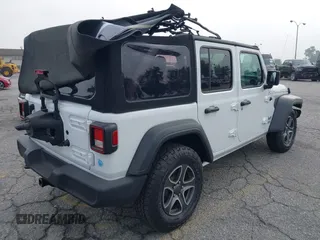 2021 Jeep Wrangler Unlimited Sport Altitude with VIN 1C4HJXDN5MW644613, listed as a IAAI auction lot 42466188 with 63,959 mi miles and . Bid and sale history available at DreamBid. Image 4.