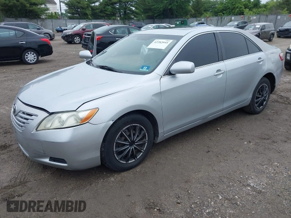2007 Toyota Camry CE with VIN 4T1BE46K77U101223, listed as a IAAI auction lot 42282044 with 153,807 mi miles and . Bid and sale history available at DreamBid. Image 2.