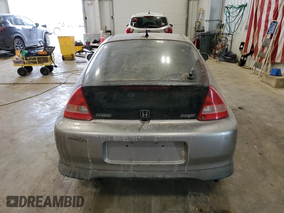 2005 Honda Insight z VIN JHMZE14775S000139, wystawiony jako Copart lot #42408425 z przebiegiem Nie podano mil oraz Czysty tytuł • Clean title. Historia ofert i sprzedaży dostępna na DreamBid. Obrazek 6.