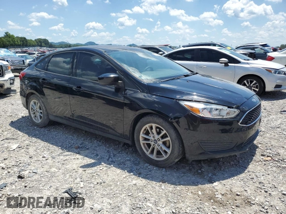 2018 Ford Focus SE z VIN 1FADP3F22JL265175, wystawiony jako Copart lot #62916255 z przebiegiem 90 348 mil mil oraz Szkoda całkowita • Salvage title. Historia ofert i sprzedaży dostępna na DreamBid. Obrazek 4.