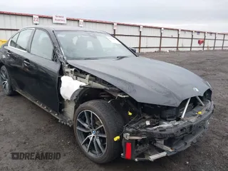 2020 BMW 3 Series 330i xDrive with VIN 3MW5R7J08L8B24642, listed as a IAAI auction lot 41112858 with 56,045 mi miles. Bid and sale history available at carsss.com. Image 1.