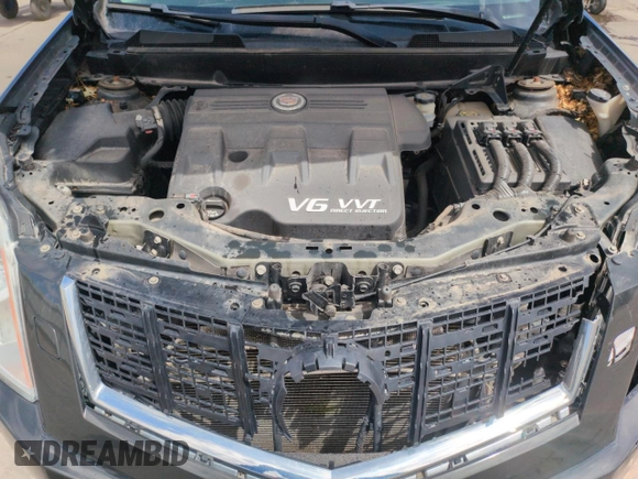2014 Cadillac SRX Premium Collection z VIN 3GYFNGE34ES676646, wystawiony jako Copart lot #53478695 z przebiegiem 115 096 mil mil oraz Szkoda całkowita • Salvage title. Historia ofert i sprzedaży dostępna na DreamBid. Obrazek 12.
