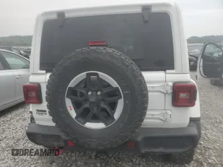2021 Jeep Wrangler Unlimited Rubicon с VIN 1C4JJXFM3MW753710, выставлен на аукционе Copart как лот 60746525 с пробегом 96 561 миль миль и Списание • Salvage title. История ставок и продаж доступна на DreamBid. Изображение 6.