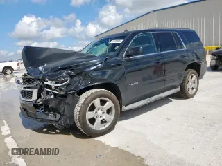 2015 Chevrolet Tahoe LT with VIN 1GNSCBKC1FR136202, listed as a Copart auction lot 62408595 with 117,869 mi miles and Salvage title. Bid and sale history available at DreamBid. Image 1.