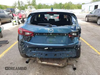 2018 Mazda 3 Touring z VIN 3MZBN1L38JM235604, wystawiony jako IAAI lot #42333995 z przebiegiem 69 541 mil mil oraz . Historia ofert i sprzedaży dostępna na DreamBid. Obrazek 16.