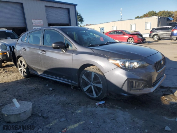 2017 Subaru Impreza Sport with VIN 4S3GTAL65H1718080, listed as a Copart auction lot 76701254 with 128,917 mi miles and Salvage Title. Bid and sale history available at carsss.com. Image 4.