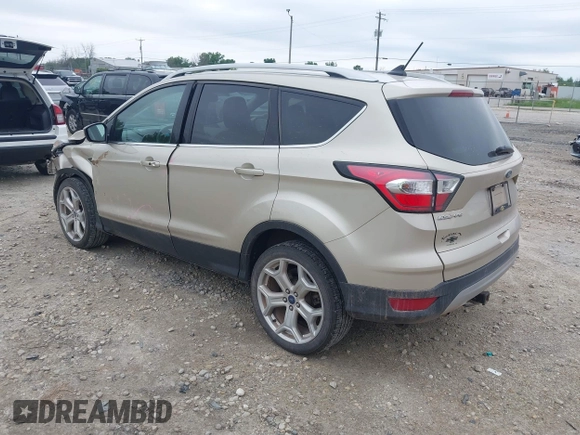 2018 Ford Escape Titanium with VIN 1FMCU9J94JUA44964, listed as a IAAI auction lot 42494471 with 100,955 mi miles and . Bid and sale history available at DreamBid. Image 3.