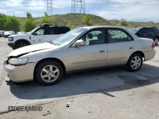 2000 Honda Accord SE z VIN JHMCG5670YC025693, wystawiony jako Copart lot #58409705 z przebiegiem 210 486 mil mil oraz Szkoda całkowita • Salvage title. Historia ofert i sprzedaży dostępna na DreamBid. Obrazek 1.