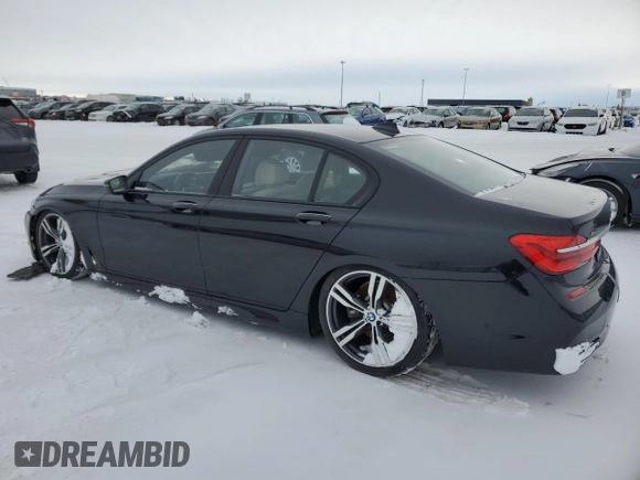 2017 BMW 7 Series 750i xDrive with VIN WBA7B0C55HG527046, listed as a Copart auction lot 41707455 with 15,947 mi miles and Salvage title. Bid and sale history available at DreamBid. Image 2.