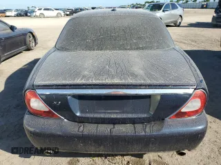 2008 Jaguar XJ with VIN SAJWA79B58SH25389, listed as a Copart auction lot 75014914 with 0 mi miles and Salvage Title. Bid and sale history available at carsss.com. Image 6.