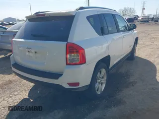 2012 Jeep Compass Latitude with VIN 1C4NJCEA7CD639298, listed as a IAAI auction lot 42121430 with 166,409 mi miles. Bid and sale history available at carsss.com. Image 4.