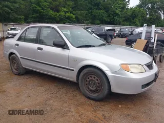 2002 Mazda Protege DX z VIN JM1BJ225720627422, wystawiony jako IAAI lot #42394277 z przebiegiem 187 864 mil mil oraz . Historia ofert i sprzedaży dostępna na DreamBid. Obrazek 1.