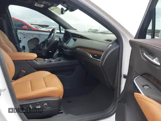 2022 Cadillac XT4 FWD Sport with VIN 1GYFZER44NF164899, listed as a IAAI auction lot 42152554 with 8,058 mi miles and . Bid and sale history available at carsss.com. Image 5.