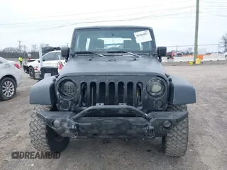 2008 Jeep Wrangler Unlimited X with VIN 1J8GA39148L577903, listed as a IAAI auction lot 41564957 with 95,359 mi miles. Bid and sale history available at carsss.com. Image 12.