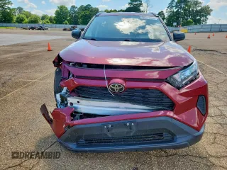 2019 Toyota RAV4 LE with VIN JTMH1RFV0KD517317, listed as a Copart auction lot 60217455 with 57,860 mi miles and Salvage title. Bid and sale history available at DreamBid. Image 5.