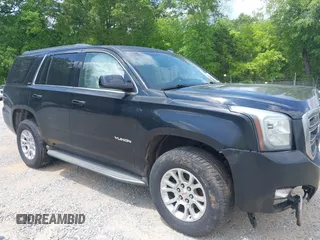 2015 GMC Yukon SLT with VIN 1GKS2BKC5FR275085, listed as a IAAI auction lot 42025693 with Not Provided miles. Bid and sale history available at carsss.com. Image 13.