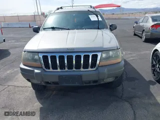 2001 Jeep Grand Cherokee Laredo with VIN 1J4GW48S81C708484, listed as a IAAI auction lot 41907414 with 1 mi miles. Bid and sale history available at carsss.com. Image 6.