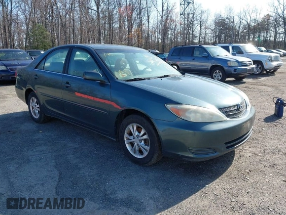 2004 Toyota Camry LE with VIN 4T1BF32K04U074276, listed as a IAAI auction lot 41940050 with 266,420 mi miles and . Bid and sale history available at DreamBid. Image 1.