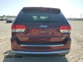 2018 Jeep Grand Cherokee Summit with VIN 1C4RJEJG2JC205073, listed as a Copart auction lot 52684975 with 29,655 mi miles and Salvage title. Bid and sale history available at DreamBid. Image 6.