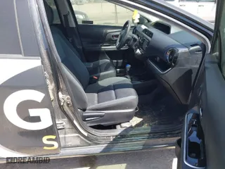 2016 Toyota Prius c One with VIN JTDKDTB35G1122931, listed as a IAAI auction lot 42009812 with 80,970 mi miles. Bid and sale history available at carsss.com. Image 5.