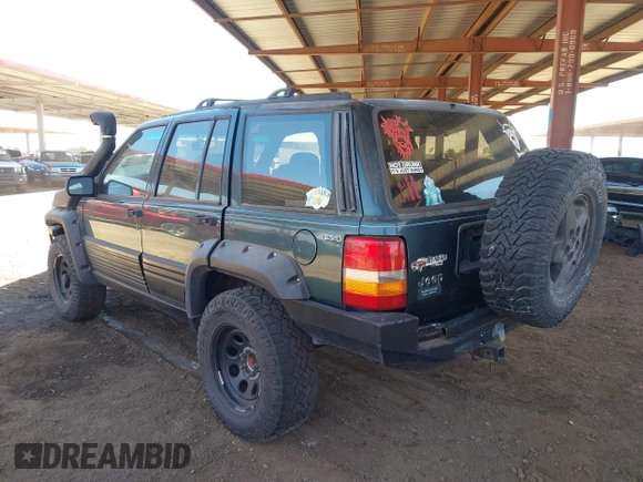 1994 Jeep Grand Cherokee Laredo with VIN 1J4GZ58S4RC280650, listed as a IAAI auction lot 42041261 with 199,265 mi miles and . Bid and sale history available at DreamBid. Image 3.
