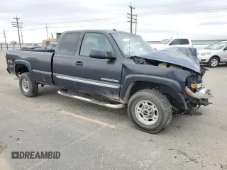 2005 GMC Sierra 2500HD SLT with VIN 1GTHK29U05E307645, listed as a Copart auction lot 80295834 with 151,225 mi miles and Salvage title. Bid and sale history available at DreamBid. Image 4.