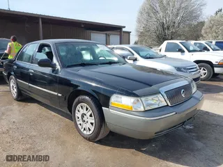 2005 Mercury Grand Marquis GS with VIN 2MEFM74W05X668975, listed as a IAAI auction lot 41795599 with 195,507 mi miles. Bid and sale history available at carsss.com. Image 1.