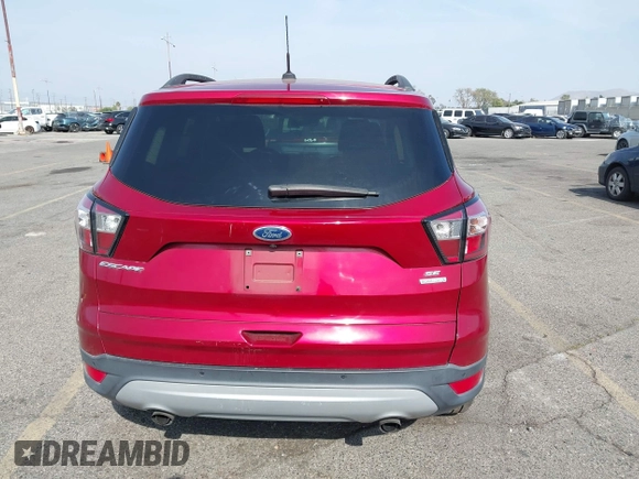 2017 Ford Escape SE with VIN 1FMCU0GD4HUC27041, listed as a IAAI auction lot 42127328 with 107,860 mi miles. Bid and sale history available at carsss.com. Image 16.