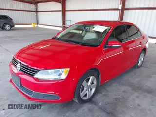 2013 Volkswagen Jetta TDI w/Premium with VIN 3VW3L7AJ2DM246343, listed as a IAAI auction lot 42157433 with 140,955 mi miles and . Bid and sale history available at DreamBid. Image 2.