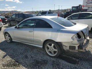 2003 Mercedes-Benz CLK-Class 5.0L with VIN WDBTJ75J33F060438, listed as a Copart auction lot 47317405 with 141,947 mi miles and Salvage Title. Bid and sale history available at carsss.com. Image 2.