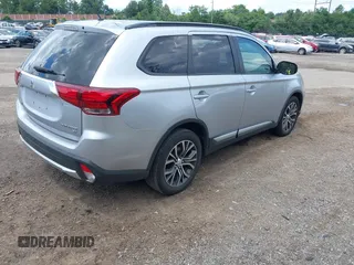 2016 Mitsubishi Outlander SE with VIN JA4AD3A34GZ005690, listed as a IAAI auction lot 42547477 with 79,040 mi miles and . Bid and sale history available at DreamBid. Image 4.