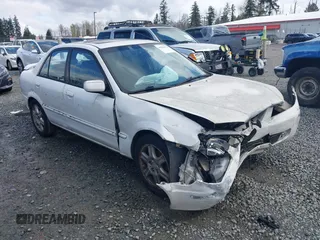 2002 Mazda Protege DX with VIN JM1BJ225520542854, listed as a IAAI auction lot 41955679 with 161,338 mi miles and . Bid and sale history available at DreamBid. Image 1.