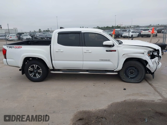 2019 Toyota Tacoma SR z VIN 3TMCZ5AN4KM220154, wystawiony jako IAAI lot #41602065 z przebiegiem 92 345 mil mil oraz . Historia ofert i sprzedaży dostępna na DreamBid. Obrazek 14.