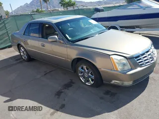 2007 Cadillac DTS Luxury I z VIN 1G6KD57Y97U198072, wystawiony jako IAAI lot #42315865 z przebiegiem 141 272 mil mil oraz . Historia ofert i sprzedaży dostępna na DreamBid. Obrazek 1.