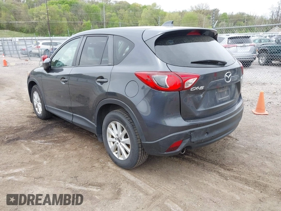 2014 Mazda CX-5 Touring with VIN JM3KE2CYXE0332517, listed as a IAAI auction lot 42109592 with 138,214 mi miles. Bid and sale history available at carsss.com. Image 3.
