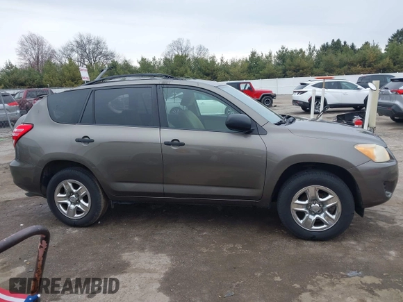 2009 Toyota RAV4 with VIN JTMZF33V59D008745, listed as a IAAI auction lot 41929275 with 126,880 mi miles and . Bid and sale history available at DreamBid. Image 14.
