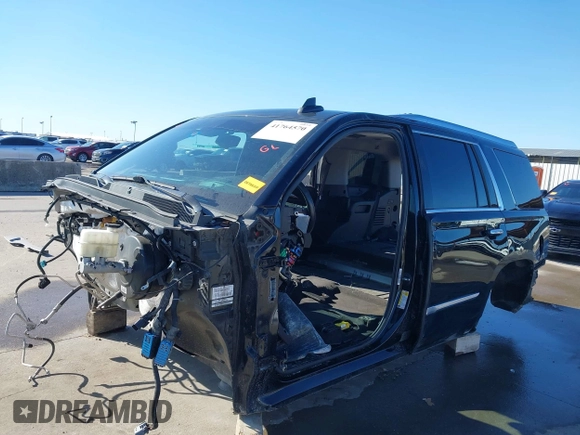 2015 Cadillac Escalade Premium z VIN 1GYS3NKJ5FR655370, wystawiony jako IAAI lot #41764570 z przebiegiem Nie podano mil oraz . Historia ofert i sprzedaży dostępna na DreamBid. Obrazek 2.