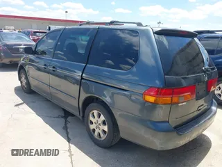 2004 Honda Odyssey EX-L with VIN 5FNRL18974B059223, listed as a IAAI auction lot 42249508 with 247,856 mi miles and . Bid and sale history available at DreamBid. Image 3.