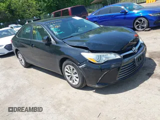 2015 Toyota Camry XLE with VIN 4T4BF1FKXFR474918, listed as a IAAI auction lot 42156470 with 68,656 mi miles and . Bid and sale history available at DreamBid. Image 1.