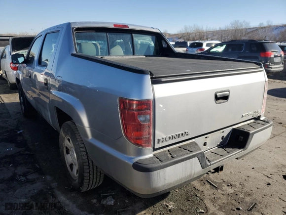 2010 Honda Ridgeline RT with VIN 5FPYK1F28AB008613, listed as a Copart auction lot 43267065 with 145,405 mi miles and Salvage Title. Bid and sale history available at carsss.com. Image 2.