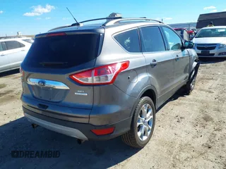 2013 Ford Escape SEL with VIN 1FMCU0HX2DUA51416, listed as a IAAI auction lot 41689474 with 140,596 mi miles and . Bid and sale history available at DreamBid. Image 4.