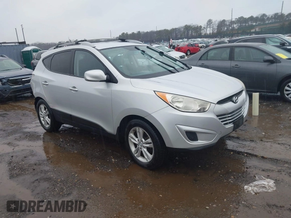2011 Hyundai Tucson Limited with VIN KM8JUCAC9BU200367, listed as a IAAI auction lot 41867617 with 228,456 mi miles and . Bid and sale history available at DreamBid. Image 1.