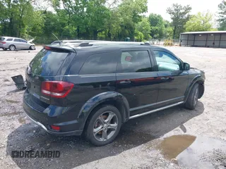 2015 Dodge Journey Crossroad with VIN 3C4PDCGBXFT543184, listed as a IAAI auction lot 42244021 with 200,000 mi miles and . Bid and sale history available at DreamBid. Image 4.