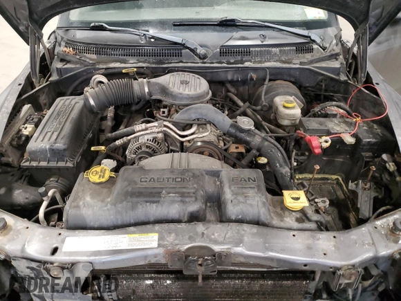 2003 Dodge Dakota z VIN 1D7GG16X23S204317, wystawiony jako Copart lot #54830745 z przebiegiem 139 508 mil mil oraz Szkoda całkowita • Salvage title. Historia ofert i sprzedaży dostępna na DreamBid. Obrazek 11.